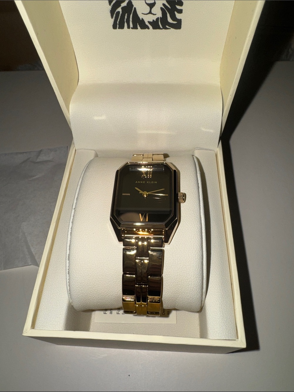 Anne Klein Gold-Tone Men’s Rectangular Black Dial Bracelet Watch